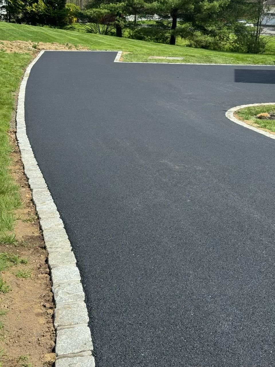 Crew paving driveway in Yorktown Heights